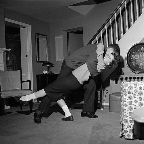 couple dancing in living room